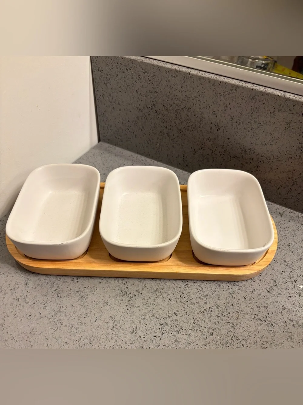 Crate & Barrel White Ceramic Triple Serving Dish on Bamboo Tray